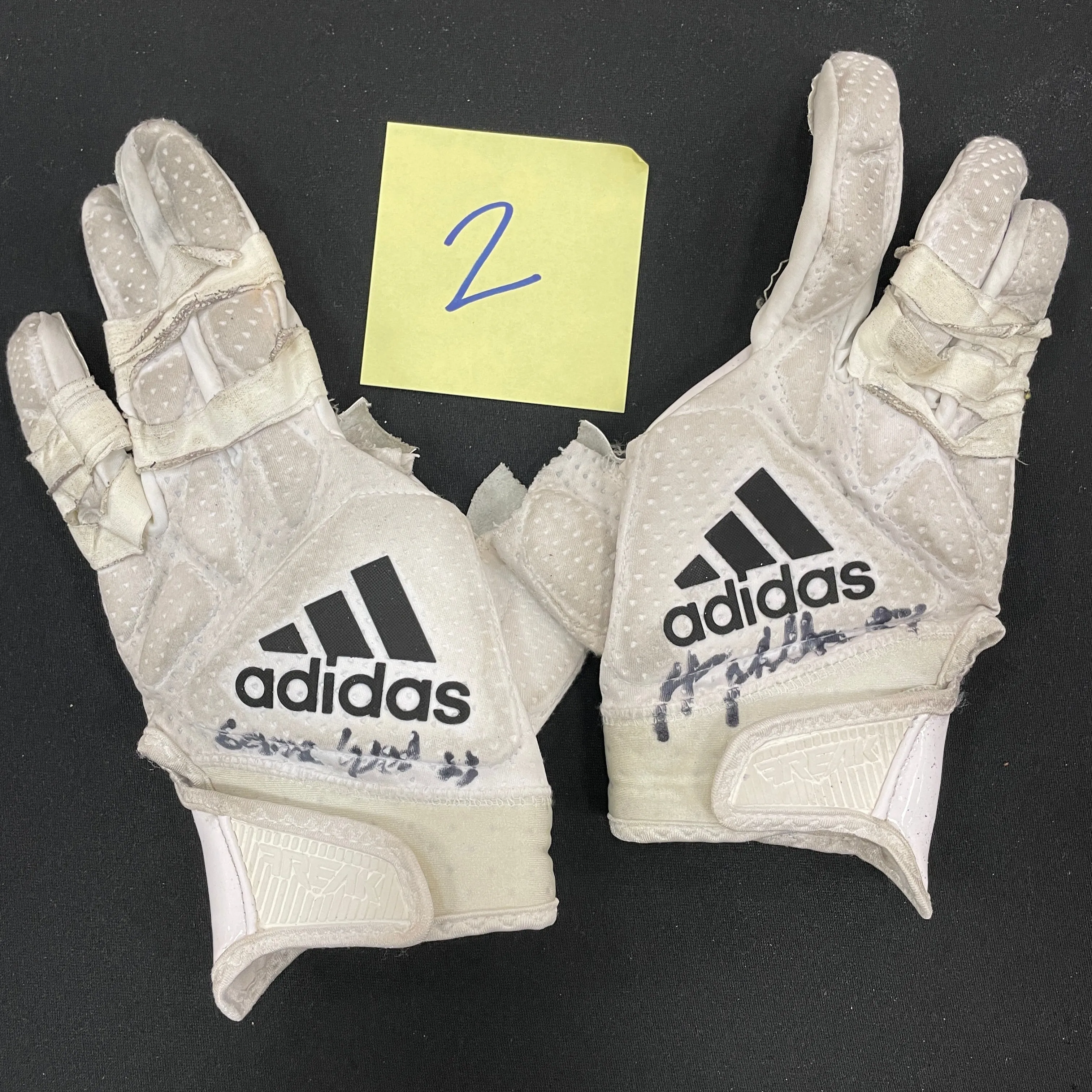 Harrison Phillips Autographed Game Used Gloves and Spikes