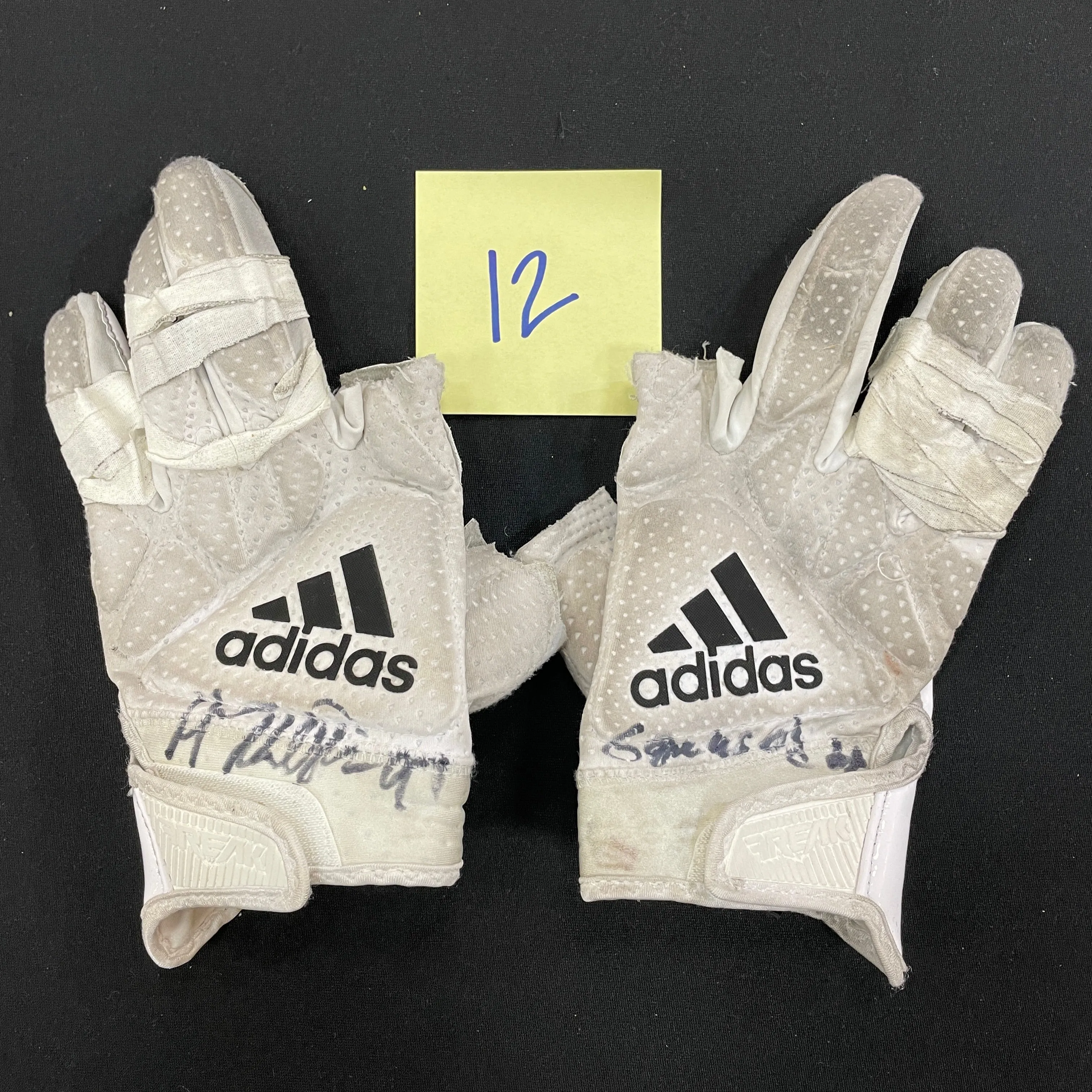 Harrison Phillips Autographed Game Used Gloves and Spikes