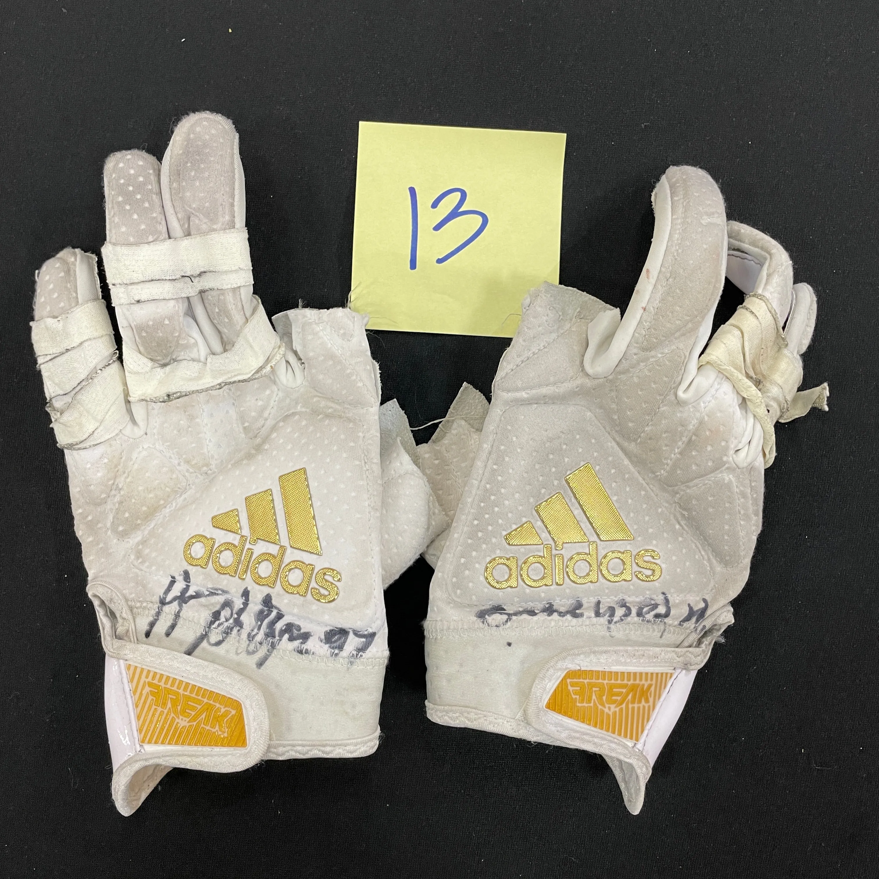 Harrison Phillips Autographed Game Used Gloves and Spikes