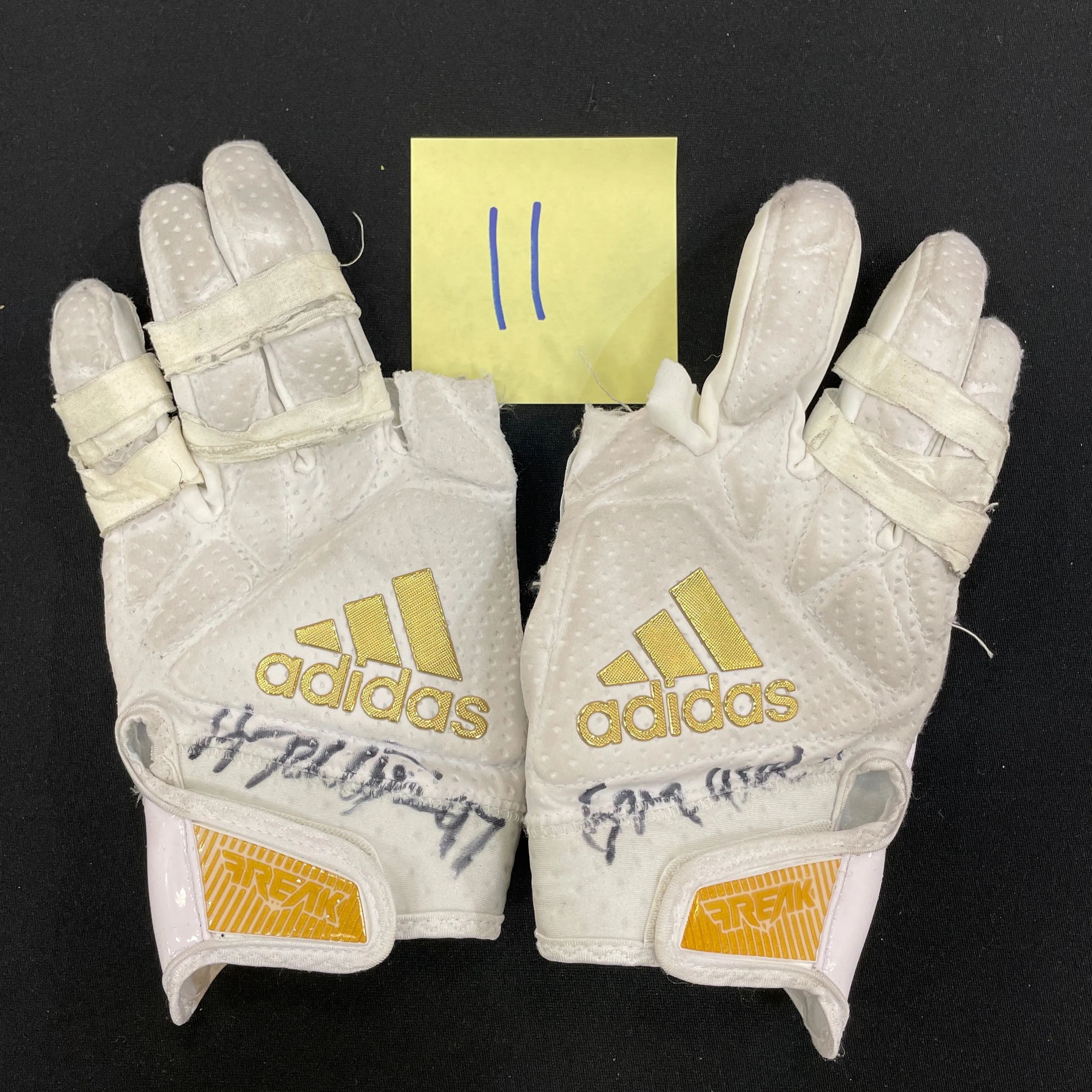 Harrison Phillips Autographed Game Used Gloves and Spikes