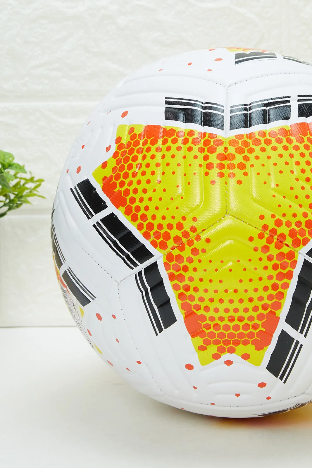 White And Yellow Printed Football